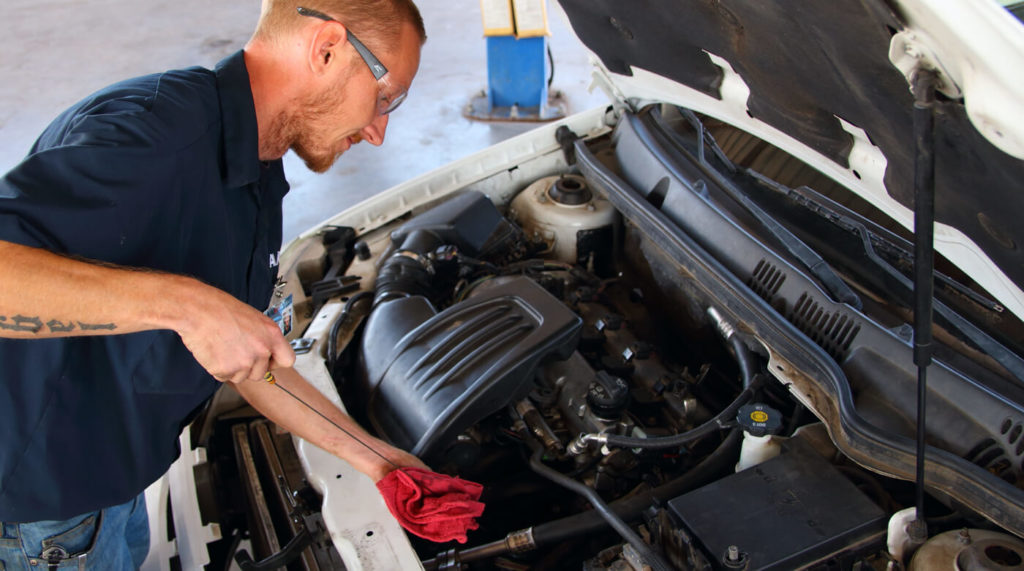 a student in the automotive services technology program