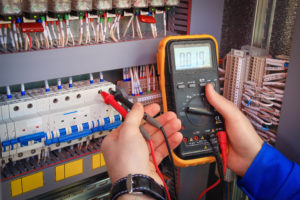 student working on electrical